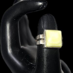 Silpada sterling silver ring with light yellow-green mother of pearl stone